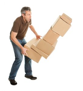 Man dropping boxes to show tips for stress free move for every member of the family