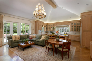 a den with a kitchen in the background to show Kitchen Renovations